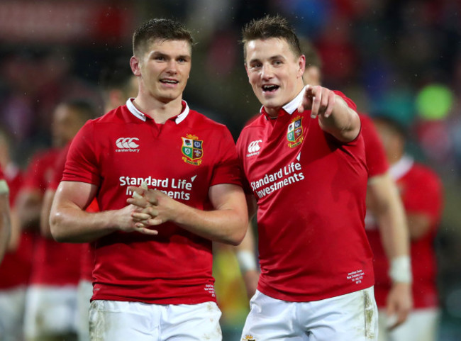 Owen Farrell and Jonathan Davies celebrate winning