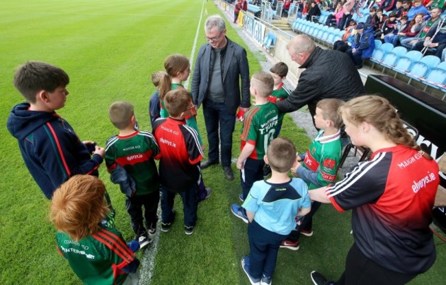 Joe Brolly greets fans before the game