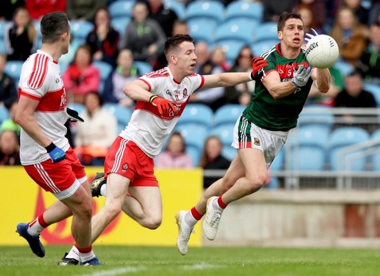 Lee Keegan palms the ball over the bar