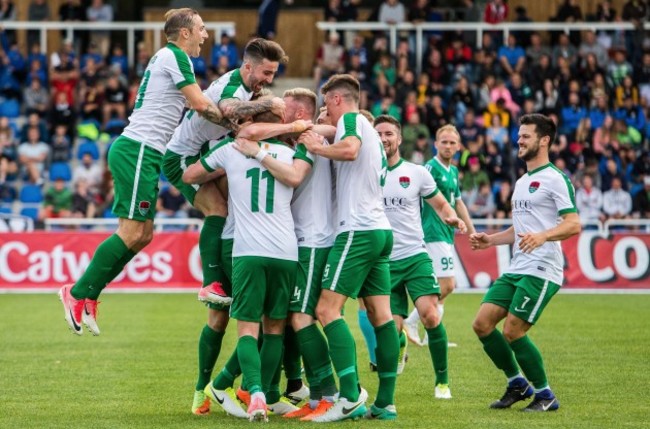 Garry Buckley celebrates scoring their first goal with teammates