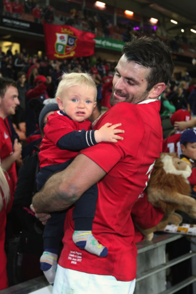 Jared Payne celebrates winning with his son Jake