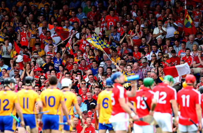 Fans watch as the teams parade