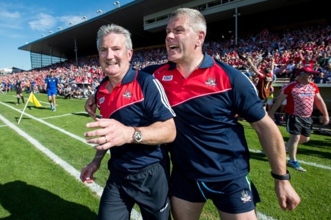 Kieran Kingston and assistant manage Diarmuid O'Sullivan celebrates at the final whistle