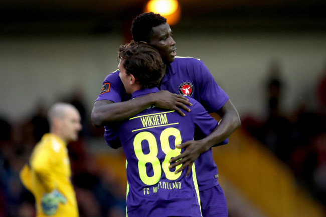 Paul Onuachu celebrates scoring with Gustav Wikheim