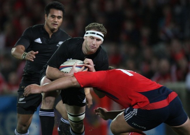 Kieran Read tackled by Tony Buckley