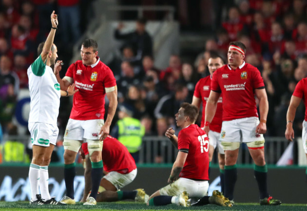 Sam Warburton speaks with Romain Poite before he awarded an accidental offside