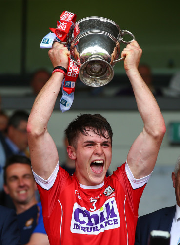 Sean O'Leary Hayes lifts the cup