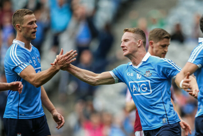 Ciaran Kilkenny celebrates scoring a goal with Paul Mannion