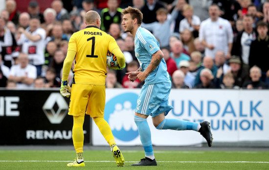 Gary Rogers with Nicklas Bendtner