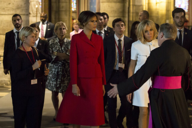 Melania Trump and Brigitte Macron arrive to visit Notre Dame Cathedrale - Paris