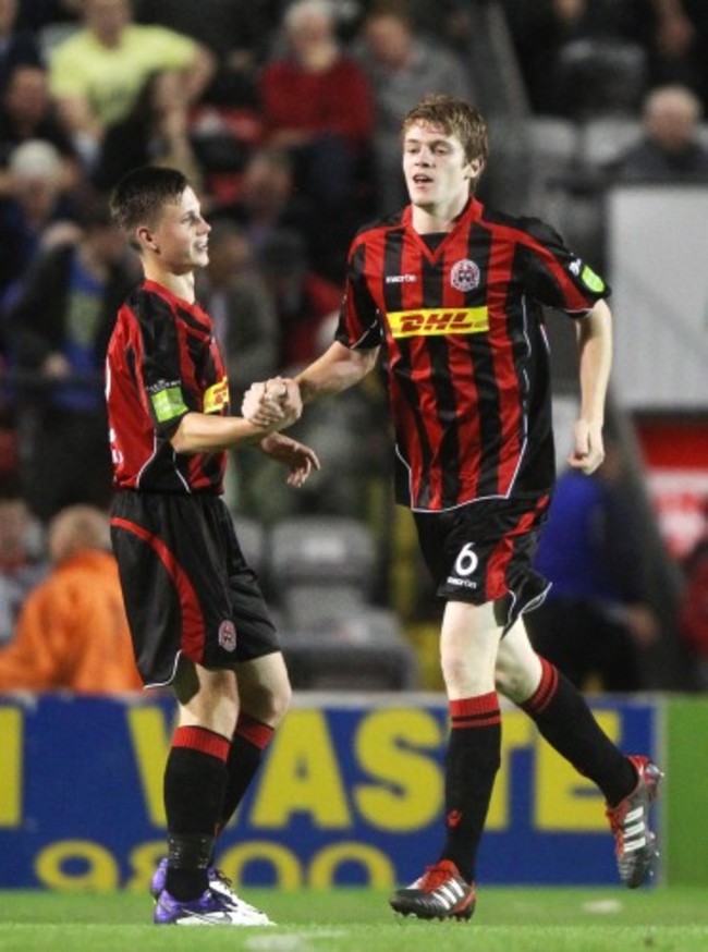 Kevin Feely celebrates with Luke Byrne