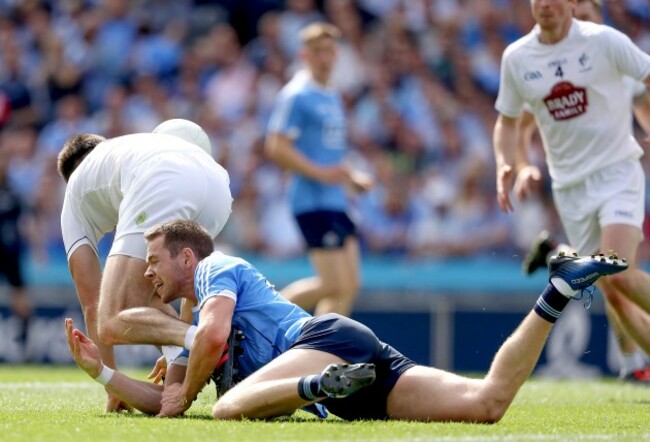 Dean Rock trips Mich O’Grady