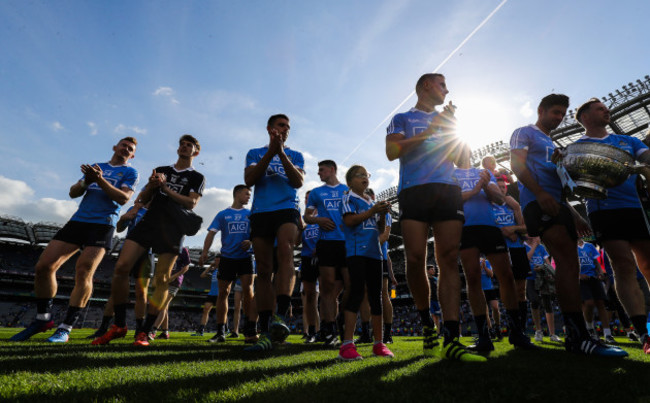 The Dublin team celebrate in front of Hill 16