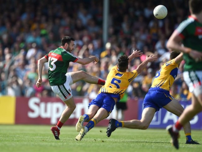 Kevin McLoughlin scores a point despite Cian O'Dea