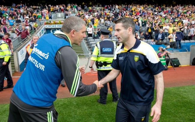 Rory Gallagher shakes hands with Kevin Walsh