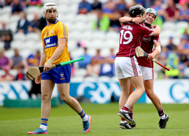 Lee Black dejected as Enda Fahey and Conor Walsh celebrate