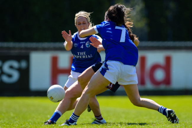 Ciara Blundell scores a goal despite the tackles of Mona Sheridan and Sheila Reilly