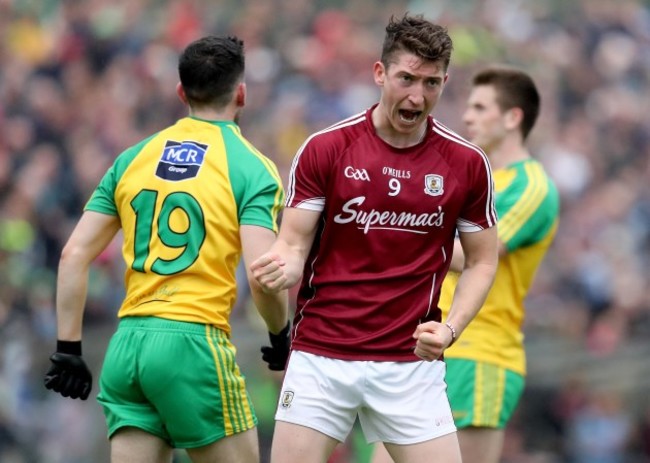 Johnny Heaney celebrates scoring a point