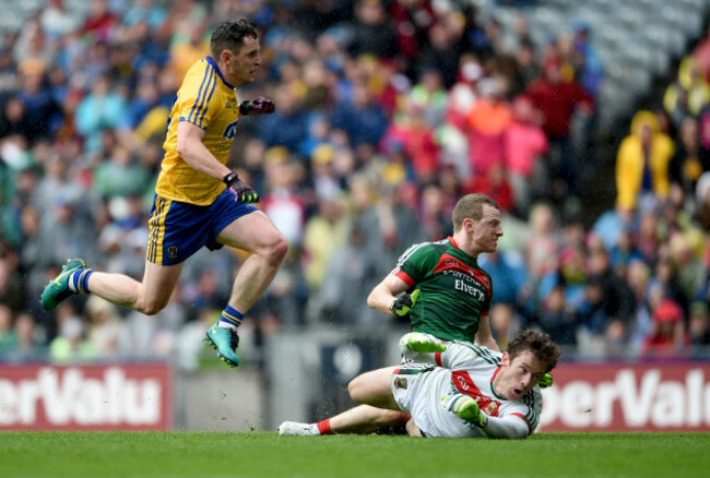 Ciarain Murtagh scores a goal despite the efforts of David Clarke and Colm Boyle