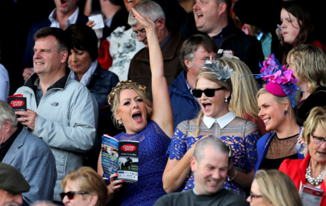 A punter celebrates a winner at the races