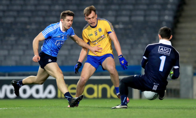 David Byrne and Stephen Cluxton with Enda Smith