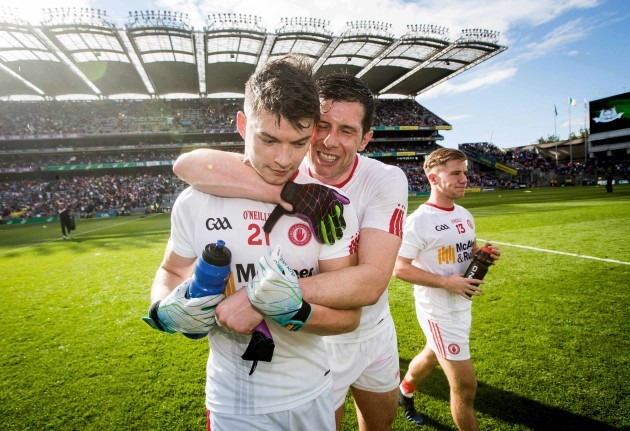 Sean Cavanagh celebrates with Richael Donnelly after the game