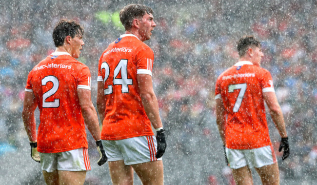 James Morgan, Anthony Duffy and Joe McElroy look on dejected as Tyrone score a late point