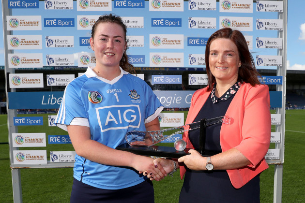 Dublin's Faye McCarthy is presented with Player of the match by Tara Kaldanis of Liberty Insurance