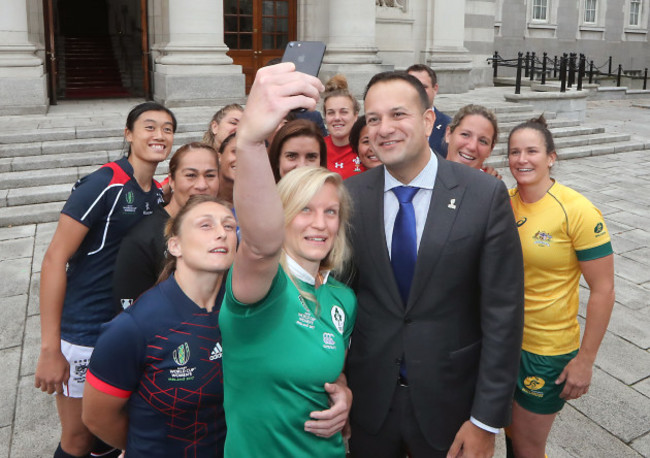 An Taoiseach Leo Varadkar takes for a selfie with Claire Malloy and the other captains