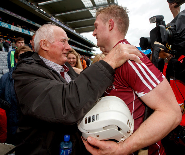 Joe Canning celebrates with his father Sean after the game