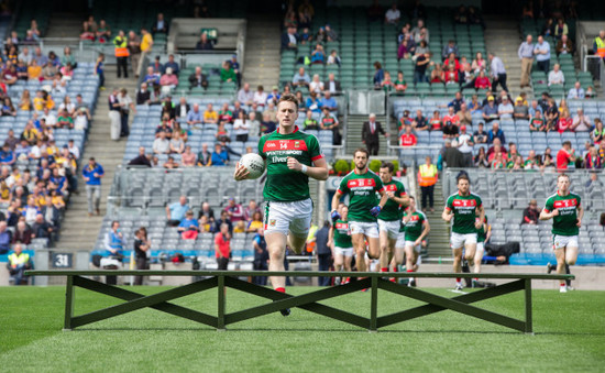 Cillian O'Connor leads his team onto the pitch