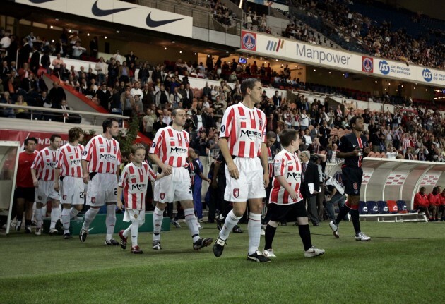 Gary Beckett leads the Derry team out