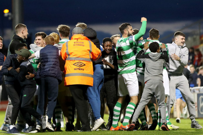 Shamrock Rovers fans invade the pitch after James Doona scores a goal