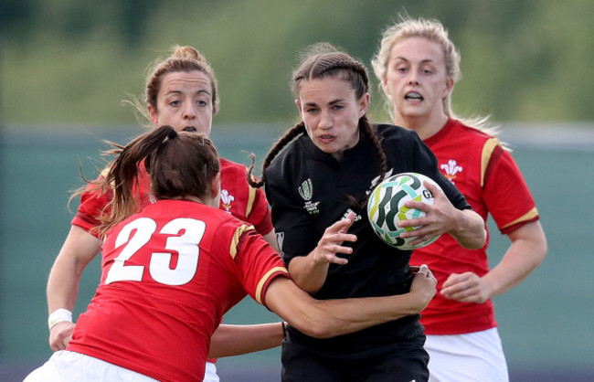 Selica Winiata is tackled by Jodie Evans