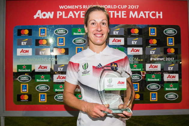 Caroline Ladagnous is presented with the AON Player of the Match award
