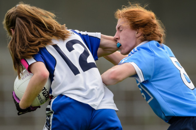 Lauren Magee receives an elbow from Katie Murray