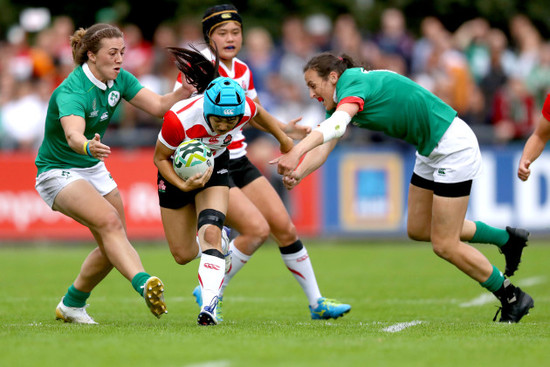 Katie Fitzhenry and Hannah Tyrrell tackle Honoka Tsutsumi