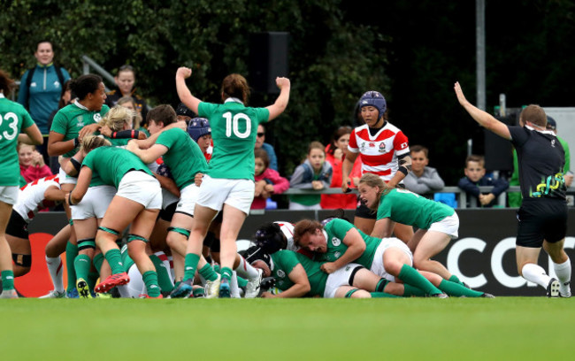 Ireland players celebrate the score of their second try