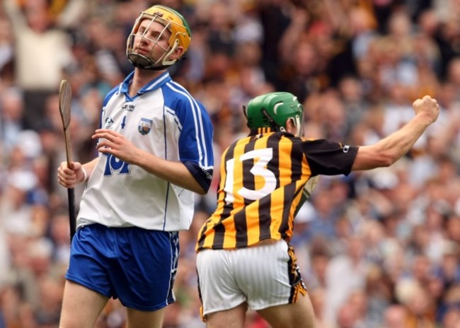 Aidan Kearney dejected as Eddie Brennan celebrates