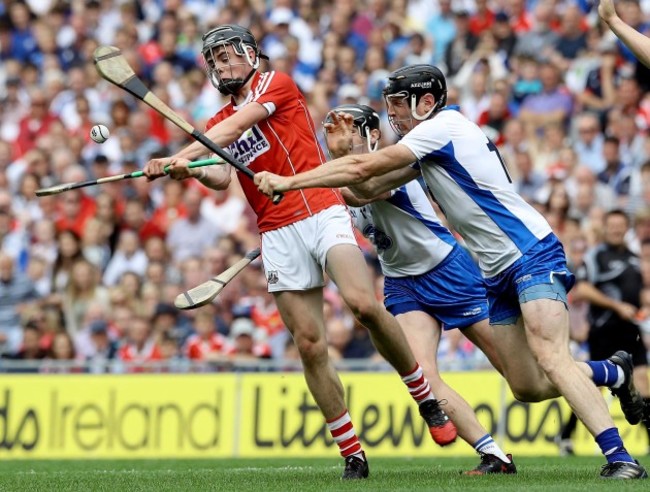 Darragh Fitzgibbon blocked by Kevin Moran