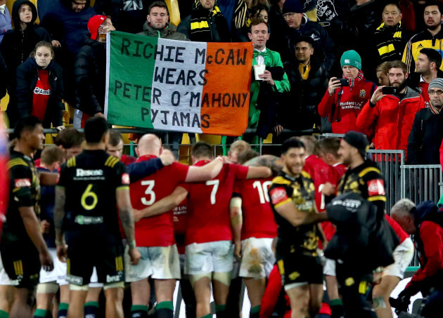 Fans with a Peter O'Mahony flag