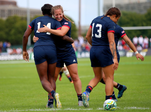 Naya Tapper celebrates her try with Deven Owsiany