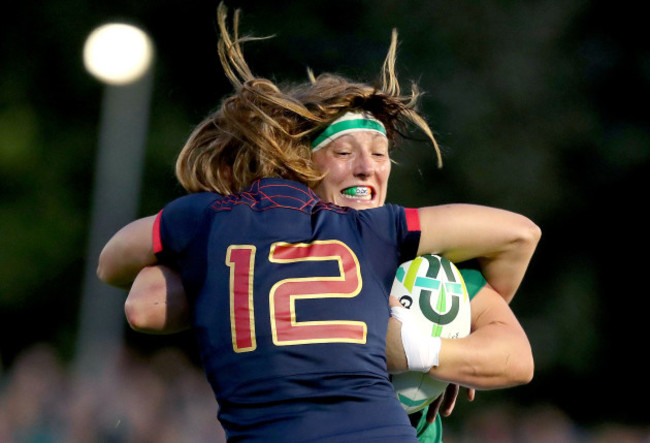 Lindsay Peat tackled by Elodie Poublan