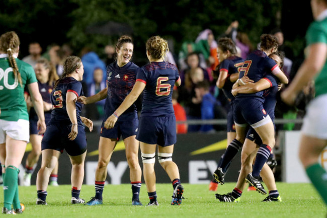 Caroline Ladagnous and Marjorie Mayans celebrate after the game