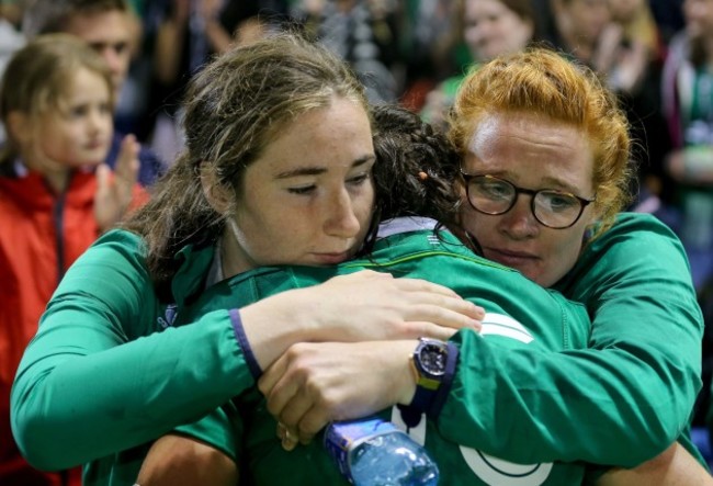 Hannah Tyrrell is comforted by friends after the game