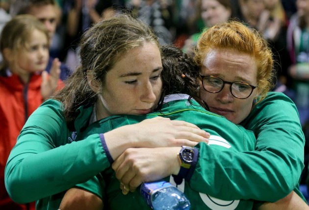 Hannah Tyrrell is comforted by friends after the game