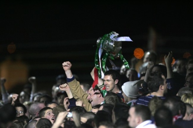 Cork's George O'Callaghan celebrates winning the league with the fans in the Shed End