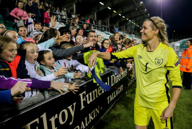 Emma Byrne gives her captain's armband to young fans