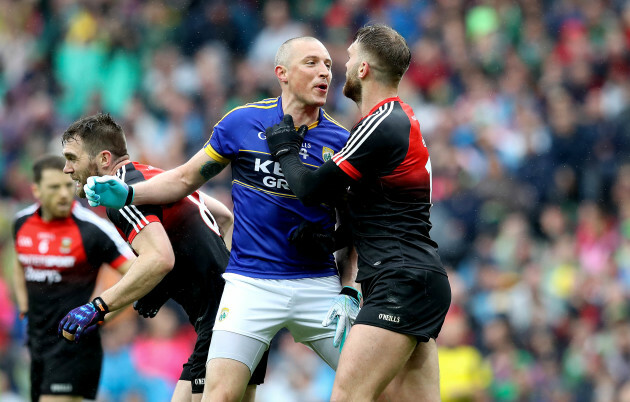 Kieran Donaghy celebrates his side's goal beside Aidan O'Shea