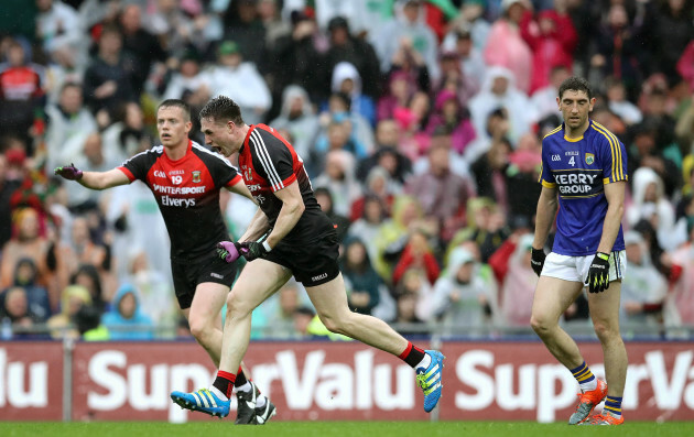 Paddy Durcan celebrates scoring the equalising point to force a replay